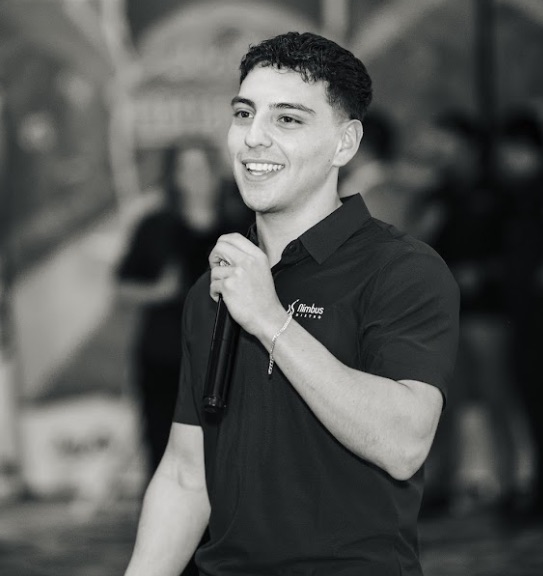 Sam Franco speaking at an event